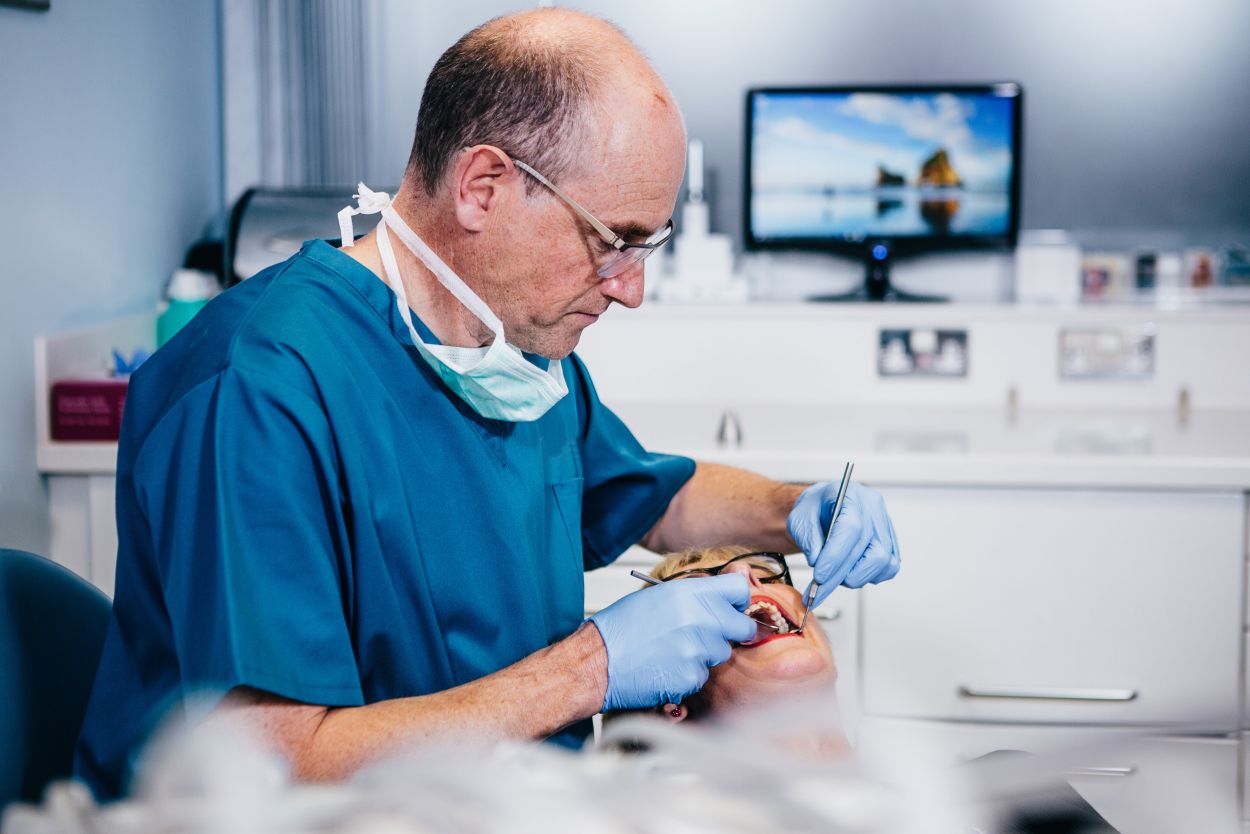 Dentist carrying out a general dental examination at Glendair Dental Practice, Alfreton